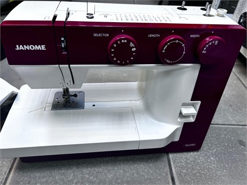 Электромеханическая швейная машина Janome 1522RD 890000702430