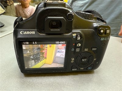 Фотоаппарат Canon EOS 1100D + объектив 890000630798